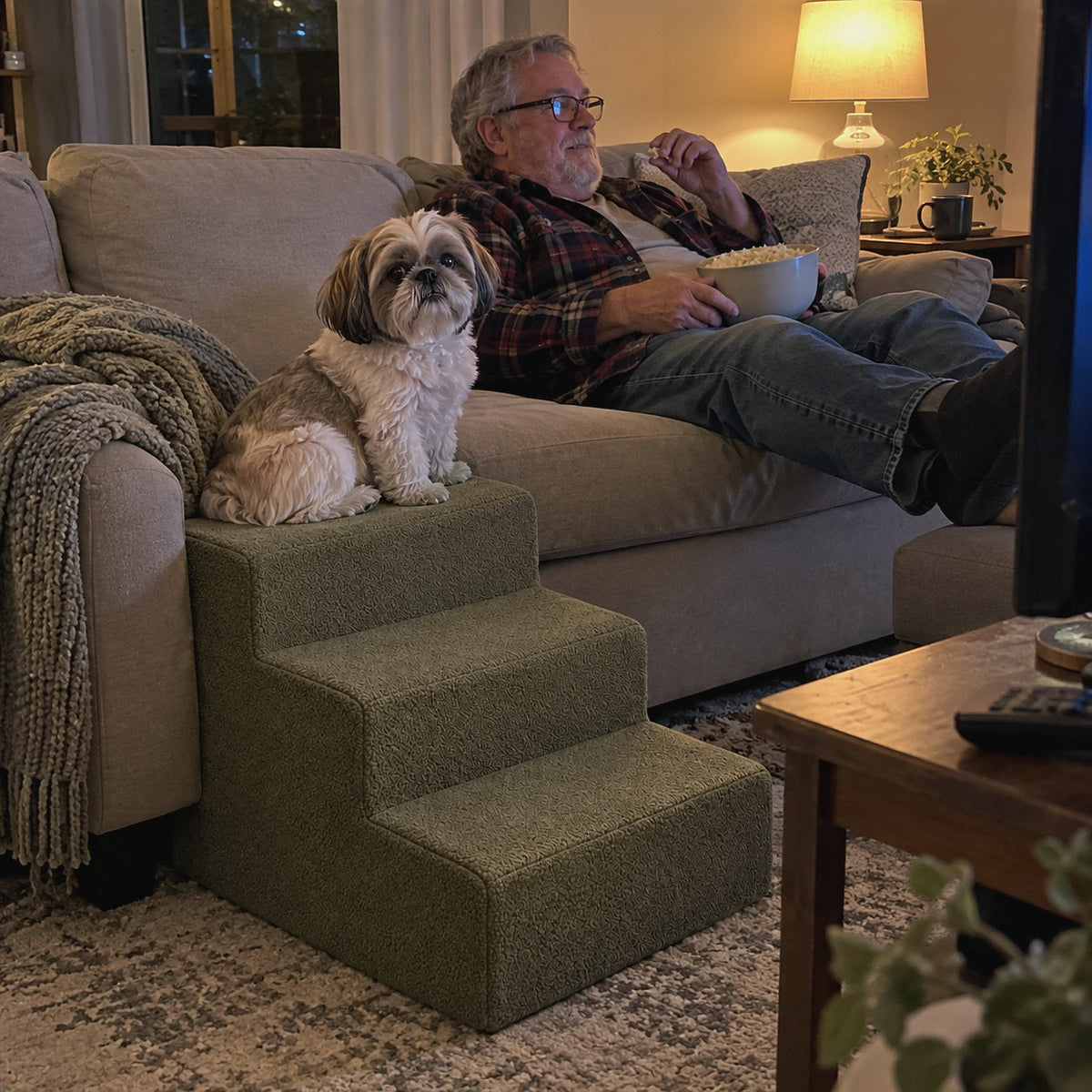 RestWell foam dog stairs in sage green, with an owner at home